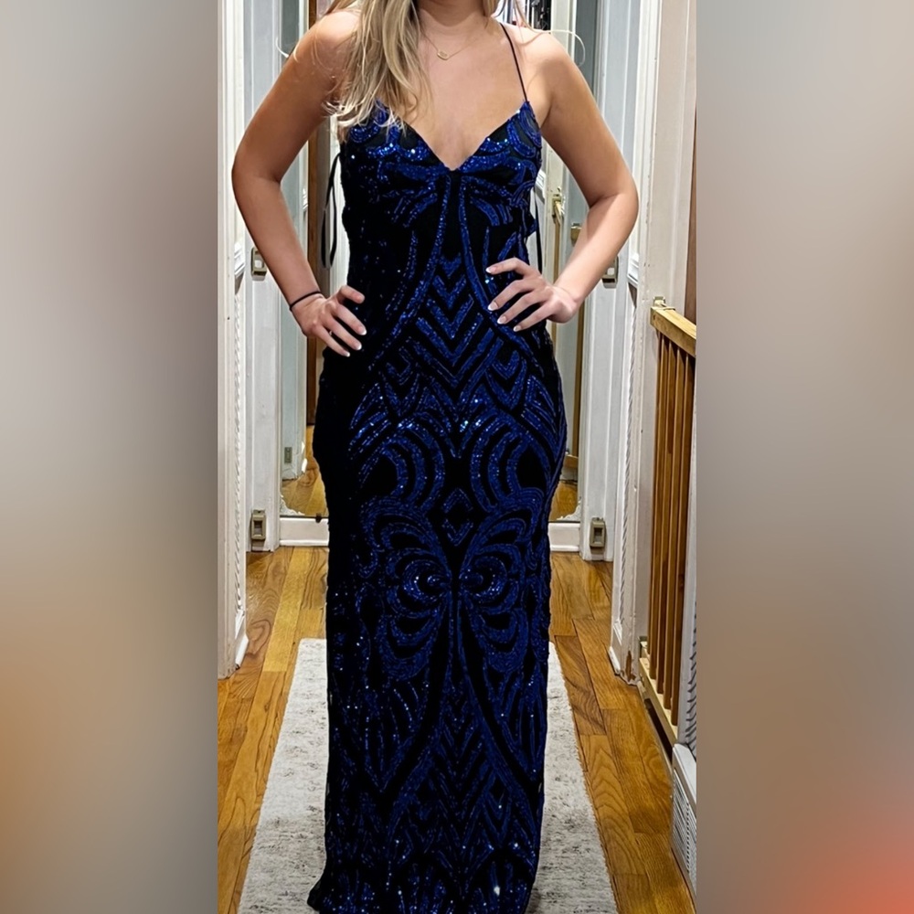 Beautiful prom dress. Never worn. No alterations. Size 4